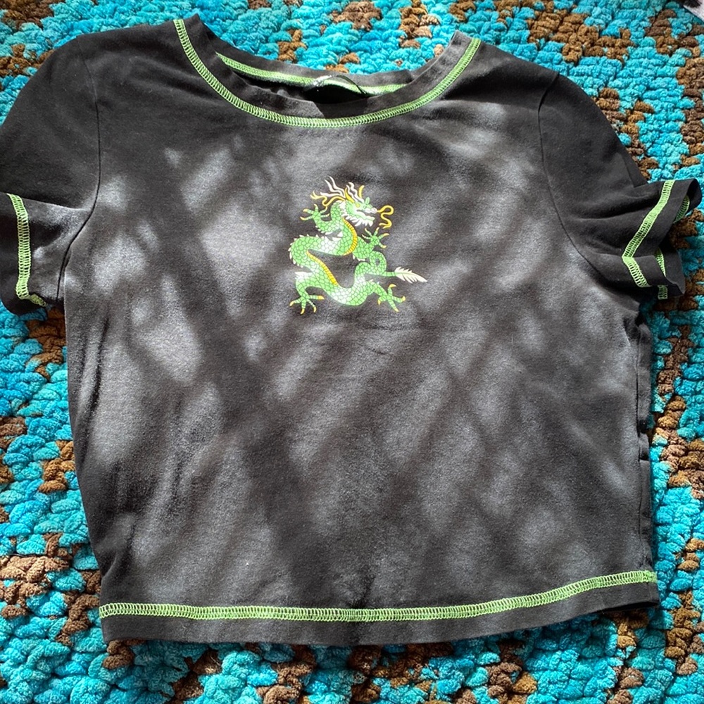 It’s a green dragon shirt from shein. Size M. Worn once.